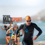 A promotional image for the Tathra MultiSport Festival featuring a runner, a cyclist, and a swimmer emerging from the water, set against a picturesque beach backdrop.